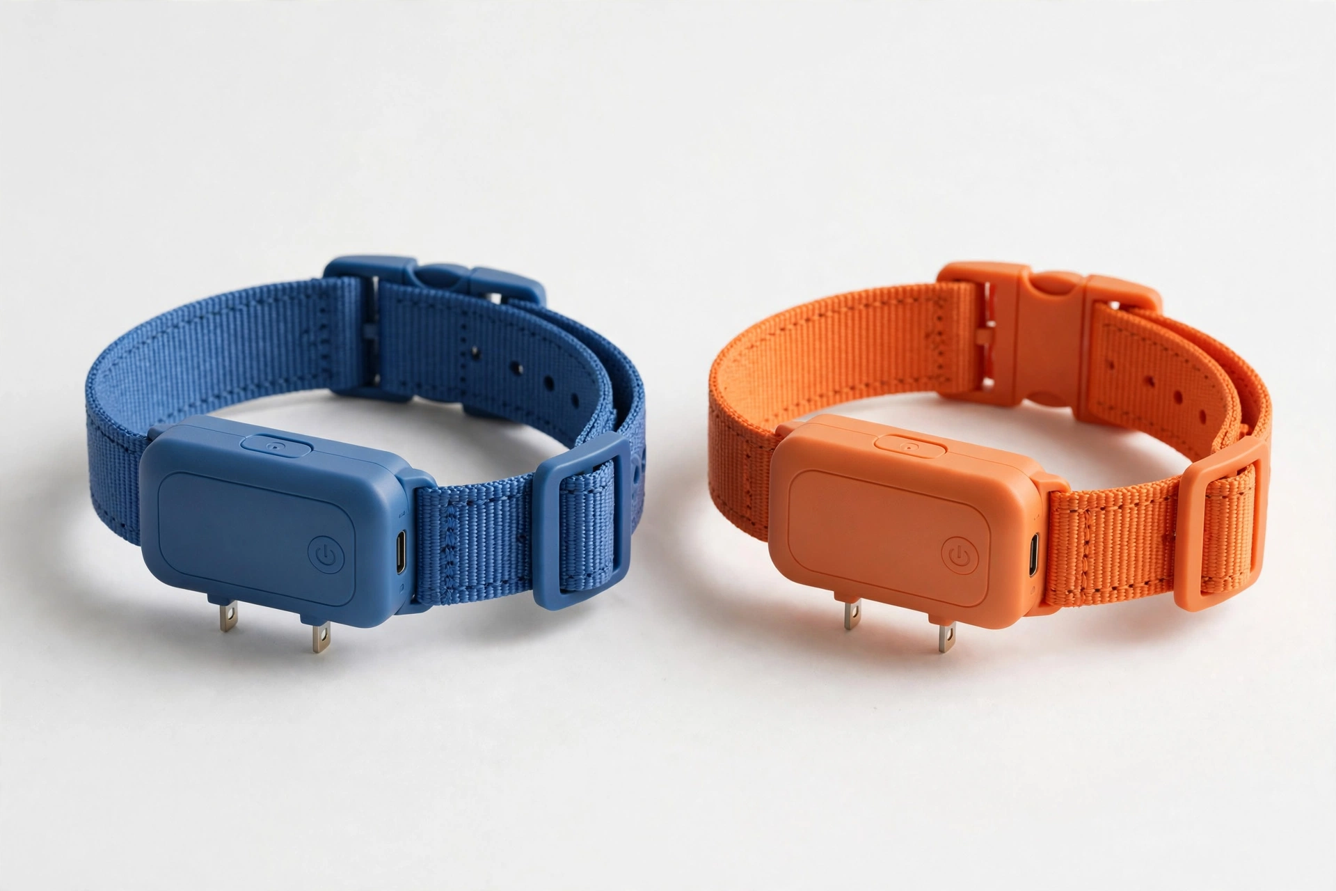 Two PawPets no-shock bark collars in blue and orange side by side, editorial product photo