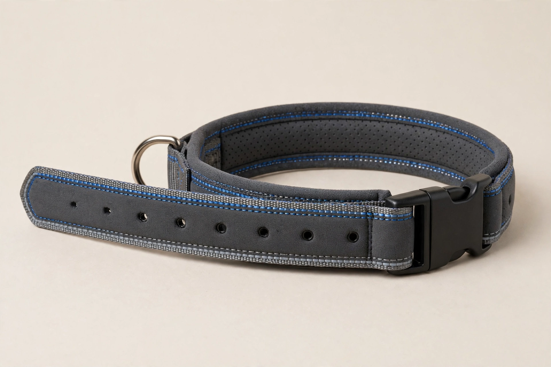 Padded neoprene dog collar with reflective stitching in a blue and grey design