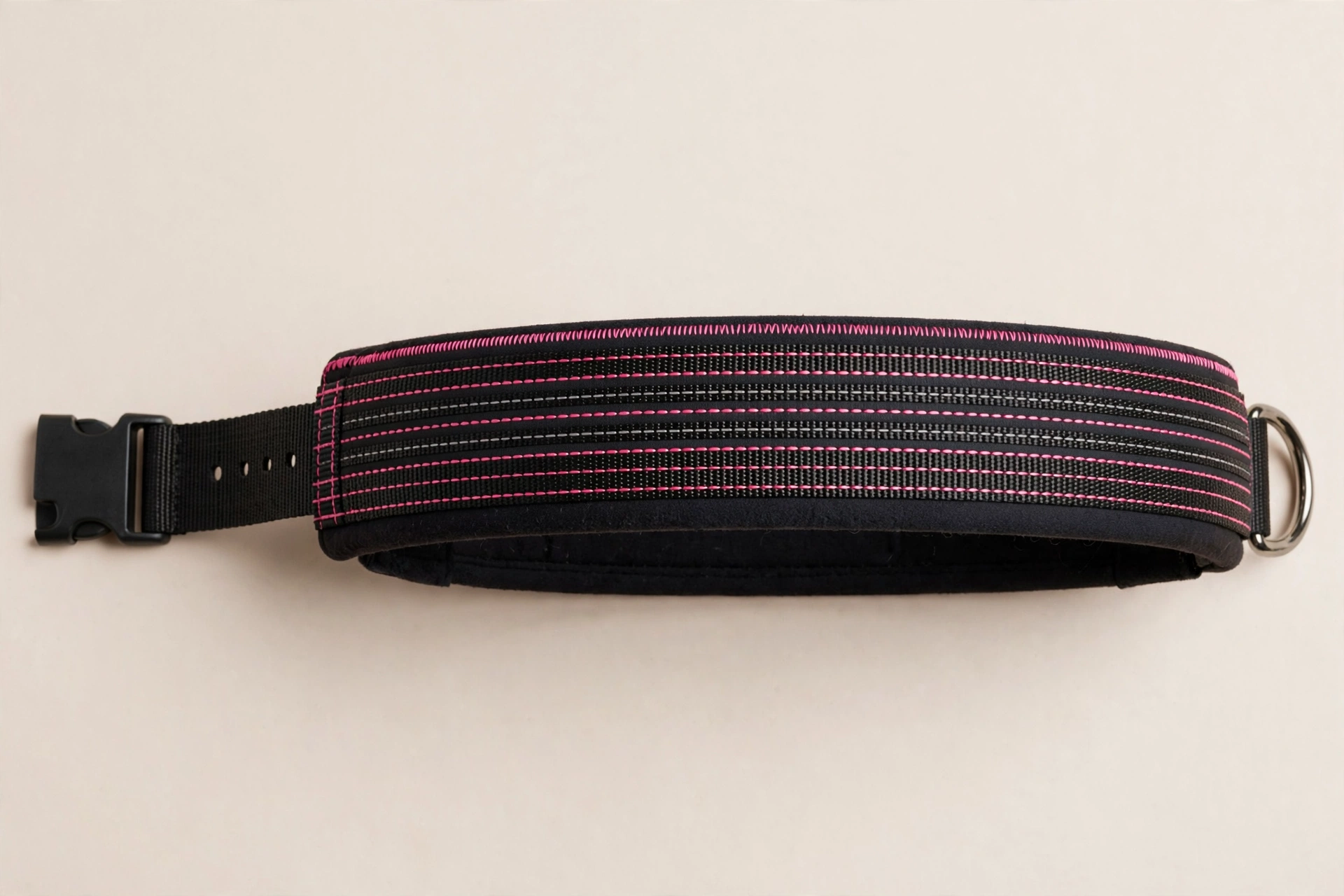 Padded neoprene dog collar with reflective stitching in pink and black