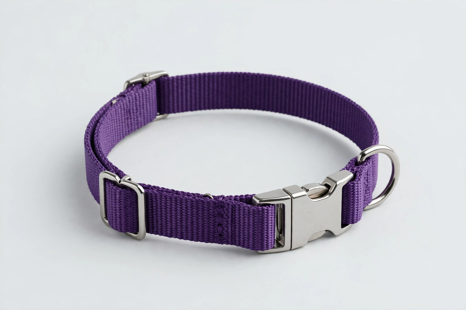 Country Brook Petz purple small dog collar with metal quick-release buckle, editorial product photo