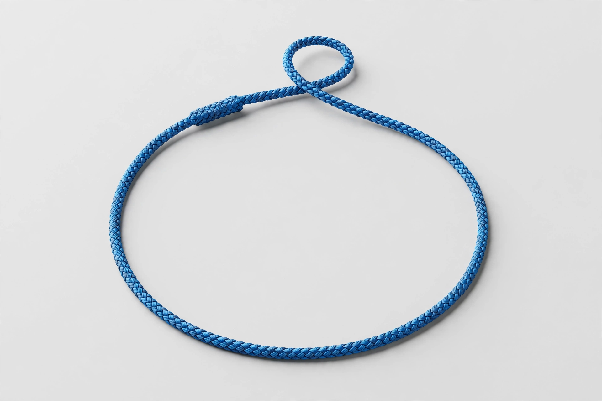 Mendota blue rope slip lead in thinner diameter, laid out on light background, editorial product photo